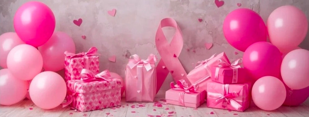 Pink balloons and gifts for a breast cancer warrior celebration